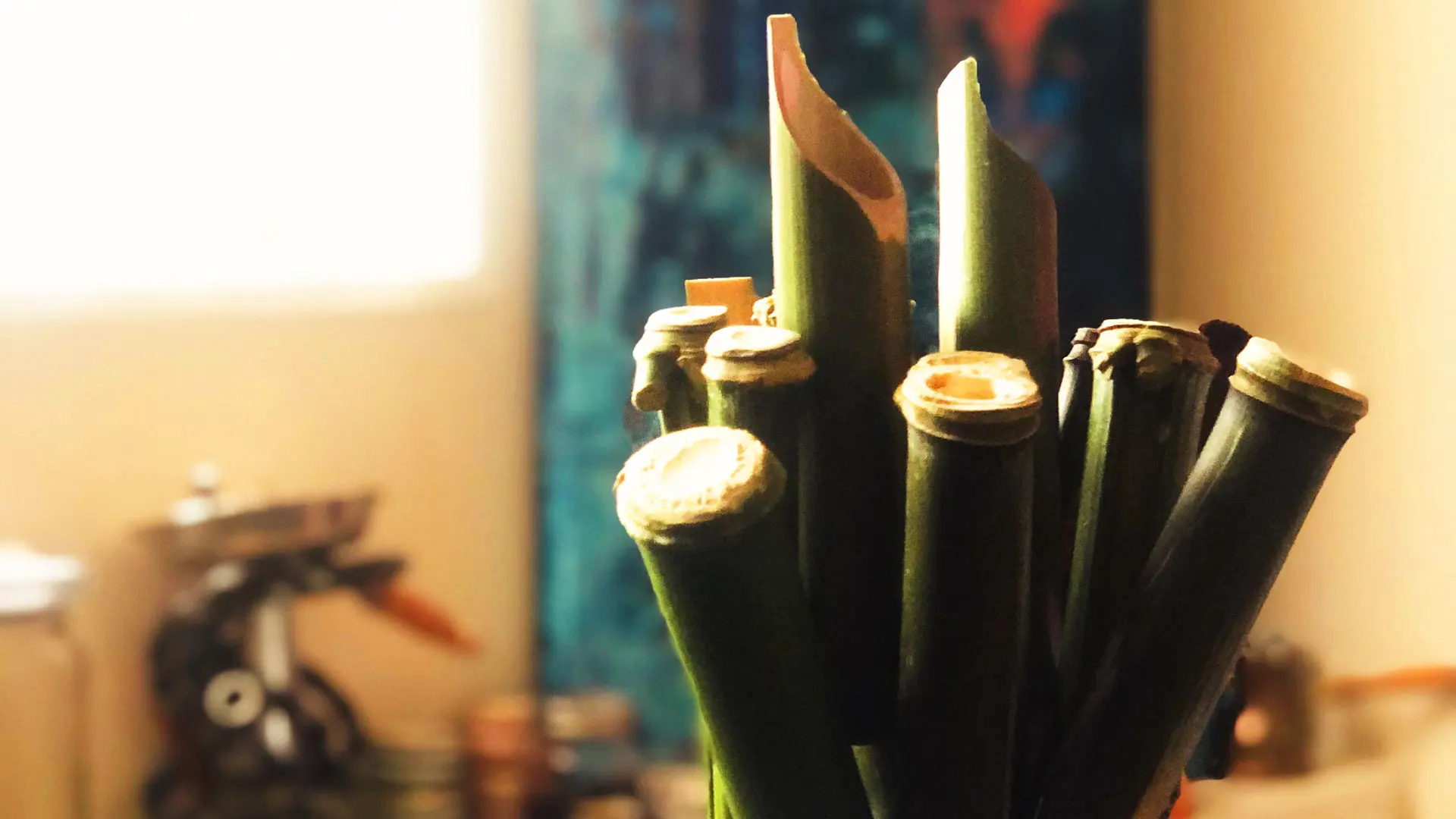 Foraged bamboo shoots in Washington, DC, are sized, cut, and whittled to make art dip pens.